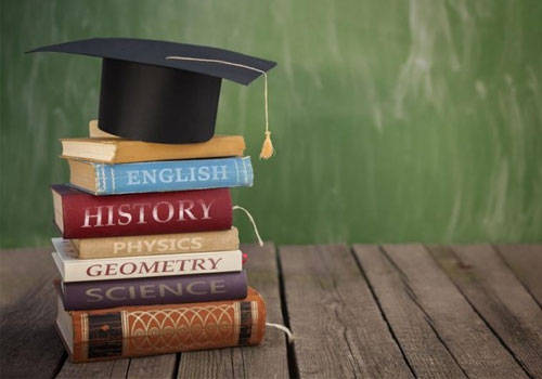 Graduation cap with books